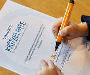 Urkunde für Kinder, die am Projekt Kritzelpate teilnehmen, Foto: Tina Umlauf